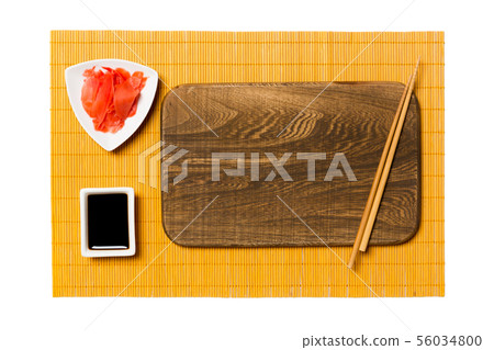 Empty rectangular brown wooden plate with 56034800