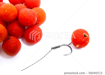 Carp fishing. Carp hook red boilies isolated on Carp fishing. Carp hook red boilies isolated on 56040513