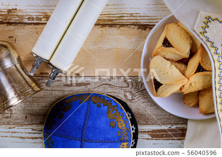 Jewish holiday Purim with carnival mask and 56040596