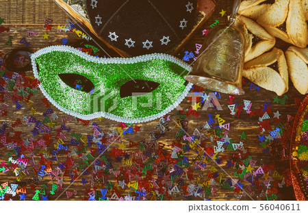 Jewish holiday Purim with carnival mask and 56040611