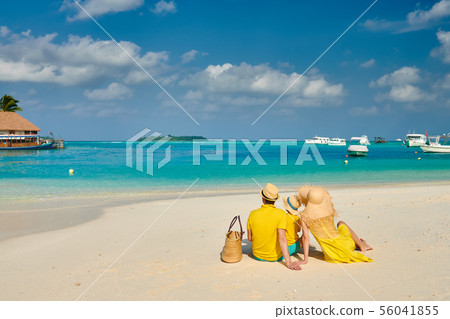 Family with three year old boy on beach 56041855