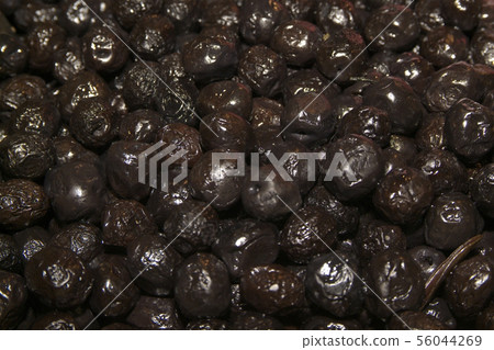 Canned black olives as background Canned black olives as background 56044269