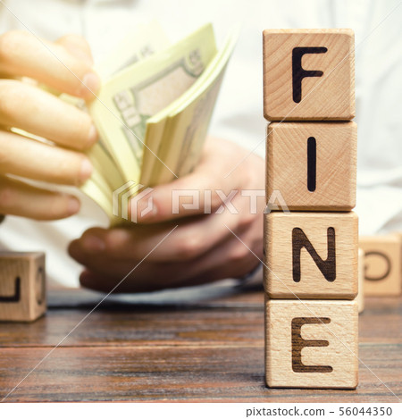 Wooden blocks with the word Fine and the man Wooden blocks with the word Fine and the man 56044350