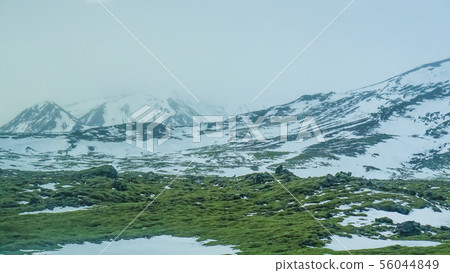 Iceland bad weather snow and fog mountaitn 56044849