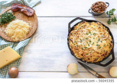 German cheese pasta dish and ingredients. Homemade German cheese pasta dish and ingredients. Homemade 56045395