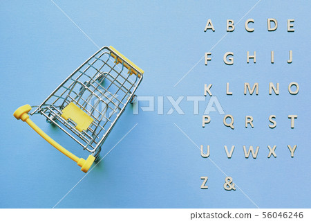 Wooden alphabet with shopping cart 56046246
