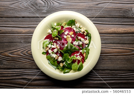 Top view at mediterranean roasted beet salad with 56046553