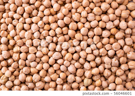 Chickpeas close-up, background. The view of top. Chickpeas close-up, background. The view of top. 56046601
