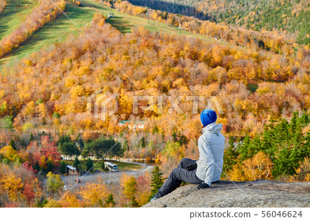 Woman hiking at Artist's Bluff in autumn Woman hiking at Artist's Bluff in autumn 56046624