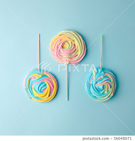 Colorful unicorn rainbow color meringue lollipops Colorful unicorn rainbow color meringue lollipops 56048071