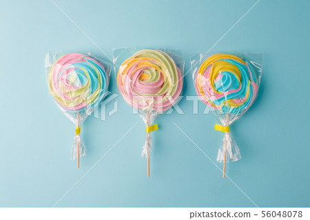 Colorful unicorn rainbow color meringue lollipops Colorful unicorn rainbow color meringue lollipops 56048078