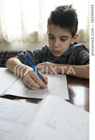 Boy do his homework 56049444
