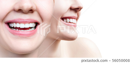 Collage of perfect female teeth closeup with text space. 56050008