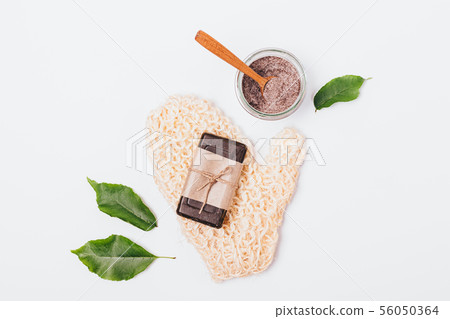 Flat lay composition of massage mitten 56050364