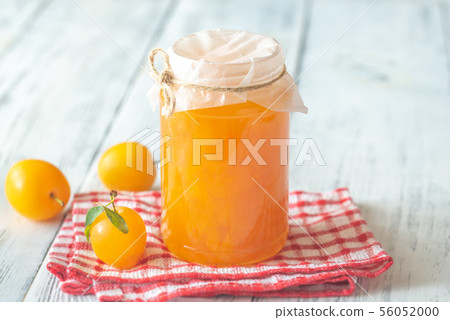 Glass jar of plum jam Glass jar of plum jam 56052000