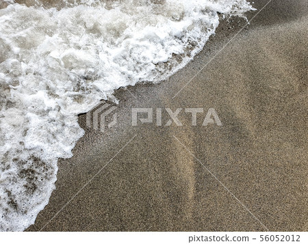 Sea wave on sandy beach 56052012