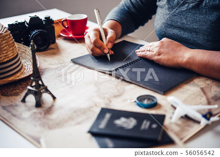Travelers are planning a trip by searching the Travelers are planning a trip by searching the 56056542