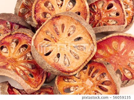 Close up slices of dried bael fruit 56059135