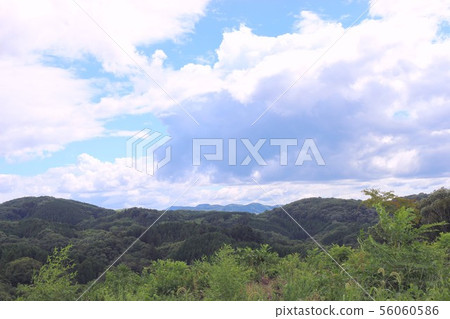 Summer clouds and mountains Summer clouds and mountains 56060586