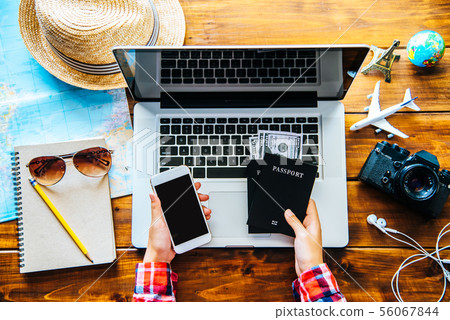 Travelers are planning a trip by searching the Travelers are planning a trip by searching the 56067844
