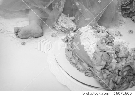 leg of baby food on white background. Feet and cake 56071609