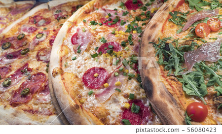 Pizza on a shop window, close-up Pizza on a shop window, close-up 56080423