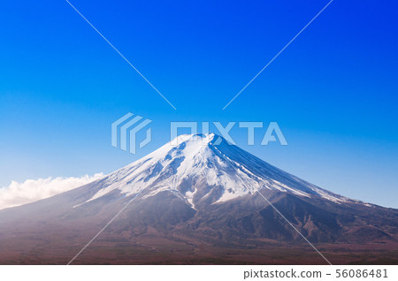 Snow covered Mount Fuji and blue sky autumn view 56086481