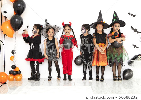 halloween party little children at home 56088232