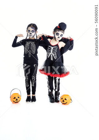 Asian Kids with face-paint and Halloween costumes 56090091