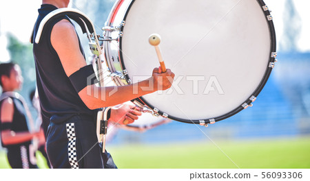 Close-up of marching band drummers marching Close-up of marching band drummers marching 56093306