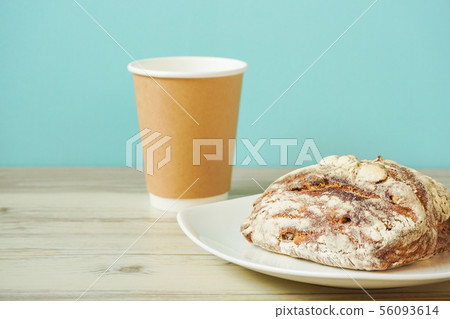 Bread and drink on the table. Rustic, French bread. Bread and drink on the table. Rustic, French bread. 56093614