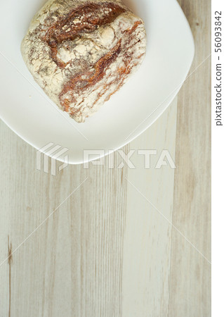 Bread on the table. Rustic, French bread. Bread on the table. Rustic, French bread. 56093842