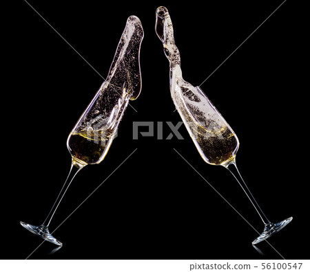 Set of luxury champagne glasses isolated on a black background Set of luxury champagne glasses isolated on a black background 56100547
