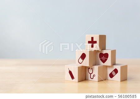 Wood block stacking with icon healthcare medical Wood block stacking with icon healthcare medical 56100585