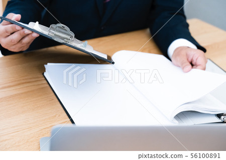 Documents and businessmen Documents and businessmen 56100891