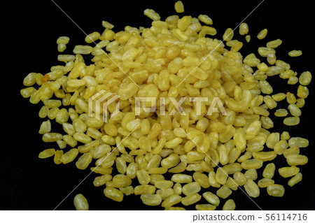 Mung bean with salt on a black background. Mung bean with salt on a black background. 56114716