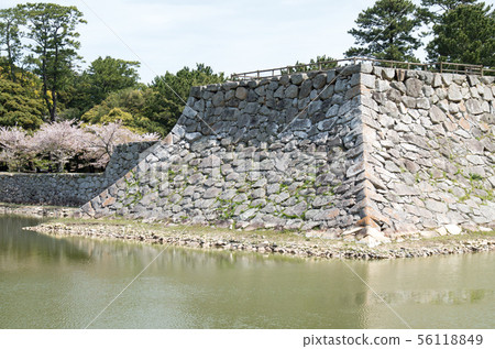 Stone wall and moat of the historic site Stone wall and moat of the historic site 56118849