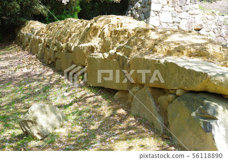 Ruins of a stone wall that has collapsed 56118890
