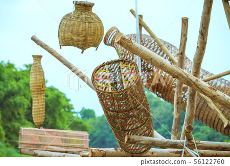 Ancient bamboo fish trap equipment of countryside, 56122760