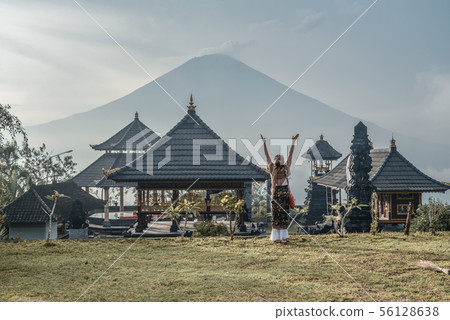 Woman near Lempuyang temple in Bali, Indonesia. Woman near Lempuyang temple in Bali, Indonesia. 56128638