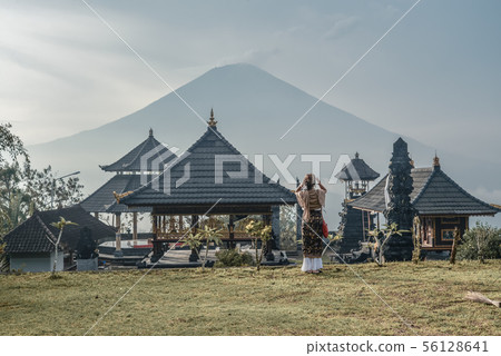 Woman near Lempuyang temple in Bali, Indonesia. Woman near Lempuyang temple in Bali, Indonesia. 56128641