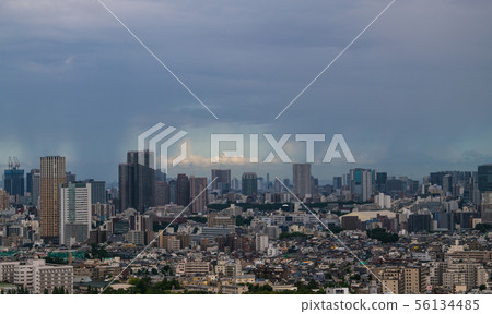 Tokyo cityscape in Japan The rain cloud that passes through the city and the approach of large typhoon No. 10 have an impact on the Tokyo metropolitan area 56134485
