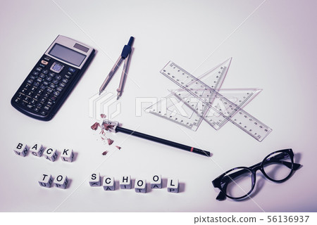 Top view of school supplies on white background Top view of school supplies on white background 56136937