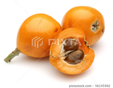 Half and whole ripe loquat fruits isolated on 56145992