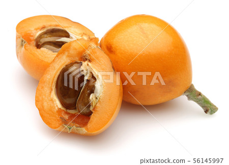 Half and whole ripe loquat fruits isolated on Half and whole ripe loquat fruits isolated on 56145997