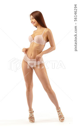 Woman In beige Lingerie Isolated On white 56146294
