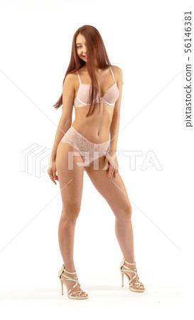 Woman In beige Lingerie Isolated On white Woman In beige Lingerie Isolated On white 56146381