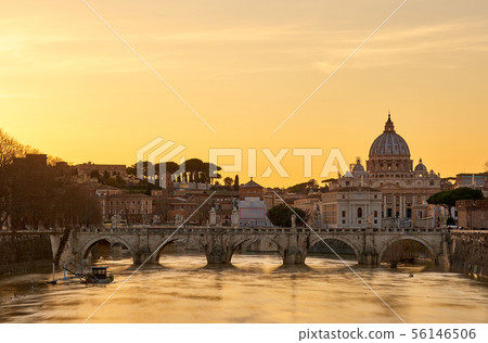 St. Peter's cathedral and Tiber river at sunset in 56146506