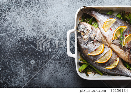 Fish dorado baked with asparagus Fish dorado baked with asparagus 56156184