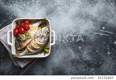 Fish dorado baked with asparagus Fish dorado baked with asparagus 56156869